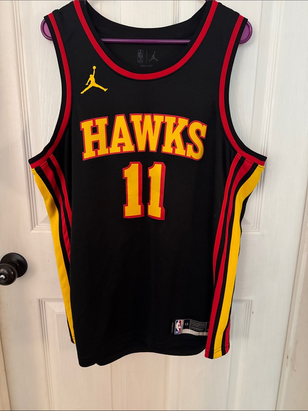 Jordan Black Hawks #11 Basketball Jersey with Red and Yellow Accents